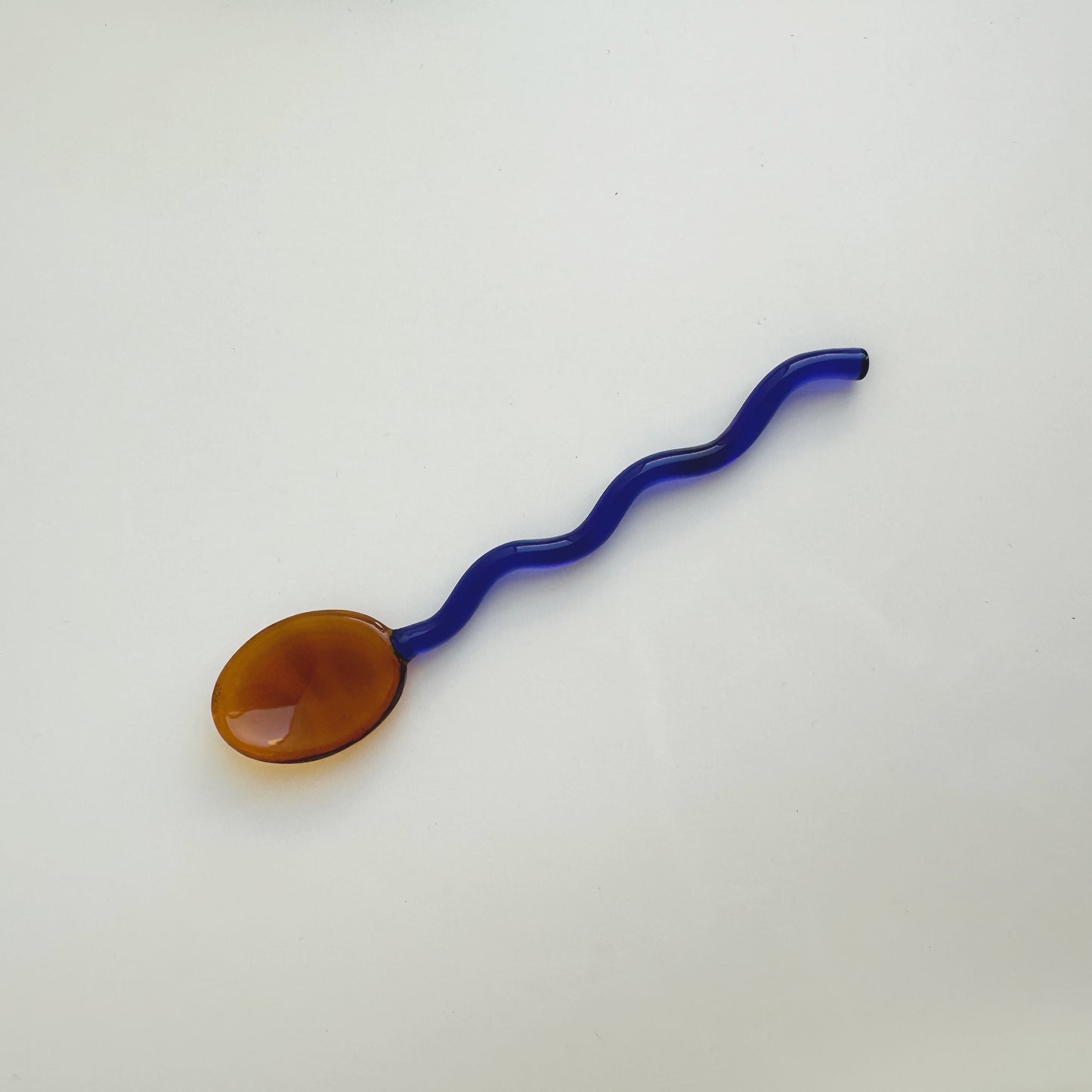 wavy glass spoon