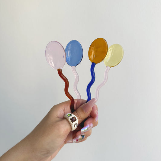 wavy glass spoon