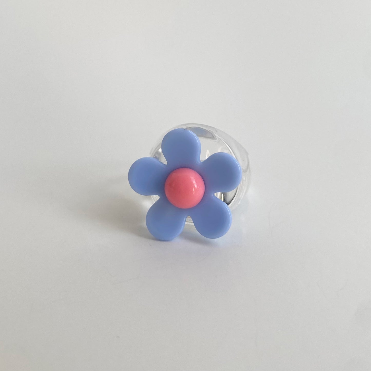acrylic flower ring in blue clear