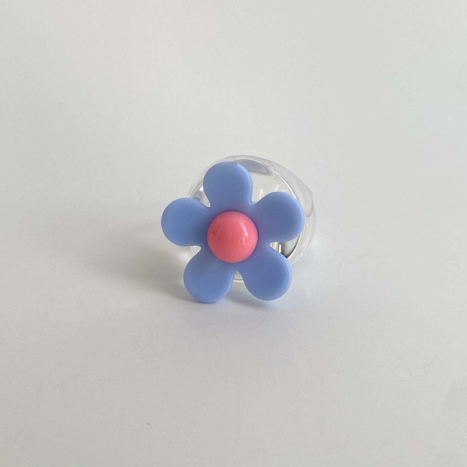 acrylic flower ring in blue clear