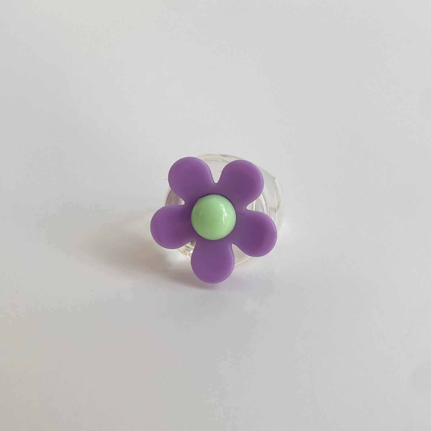 acrylic flower ring in purple clear