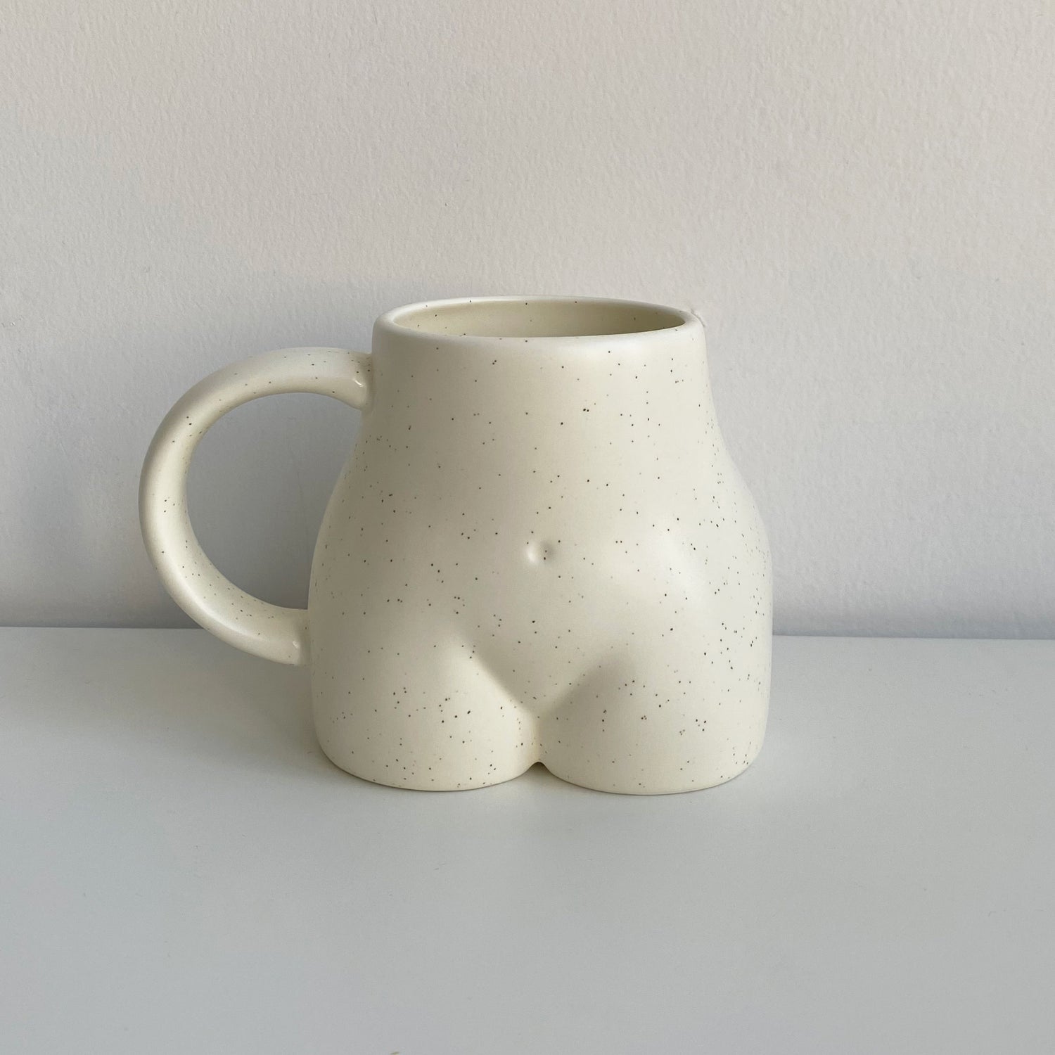 body figure ceramic mug front in cream
