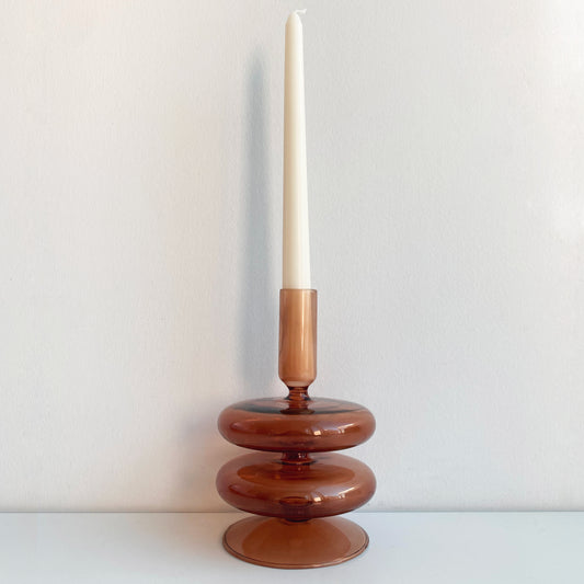 unique candlestick holder in amber with taper candle