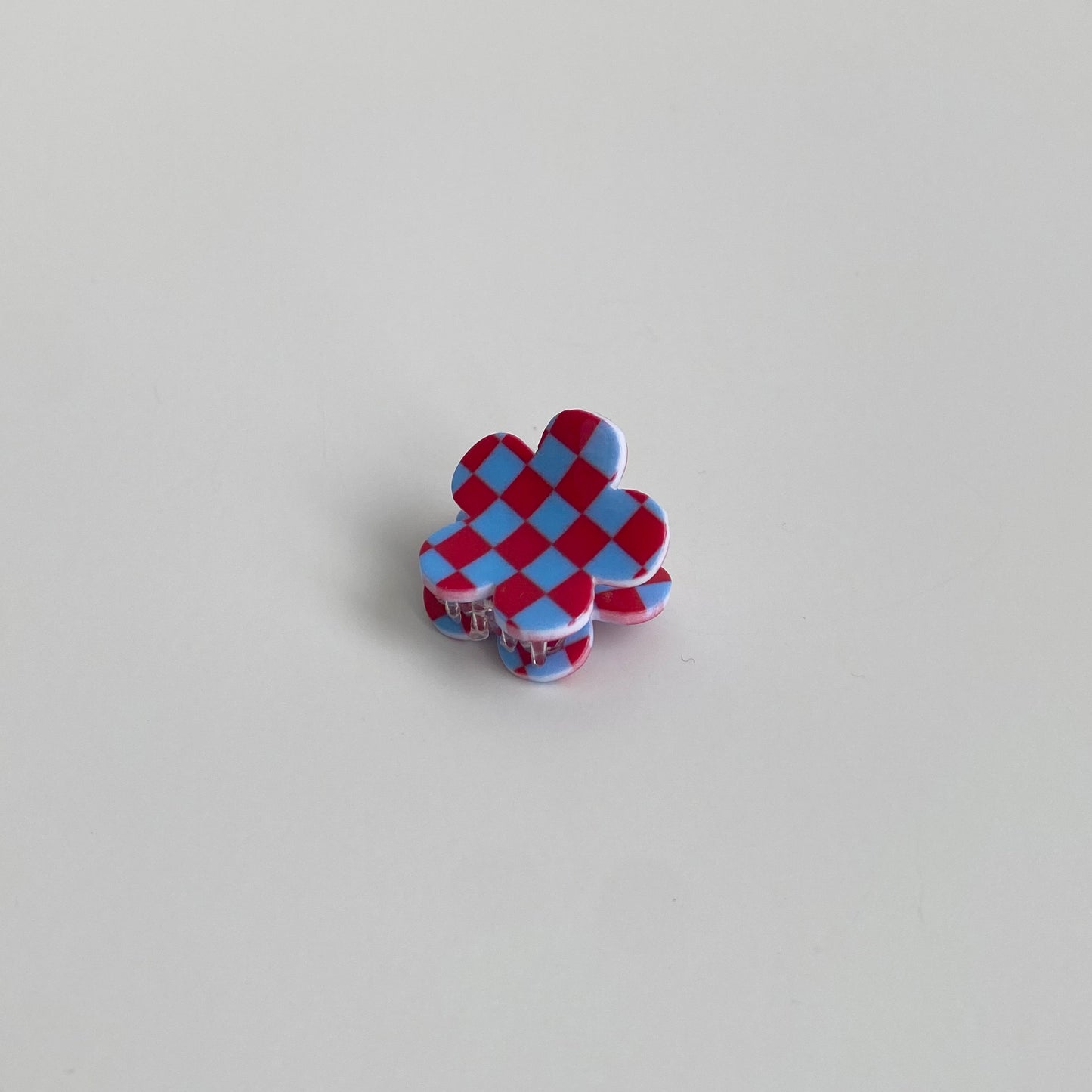 Checkered hair clip in blue & red checkered flower