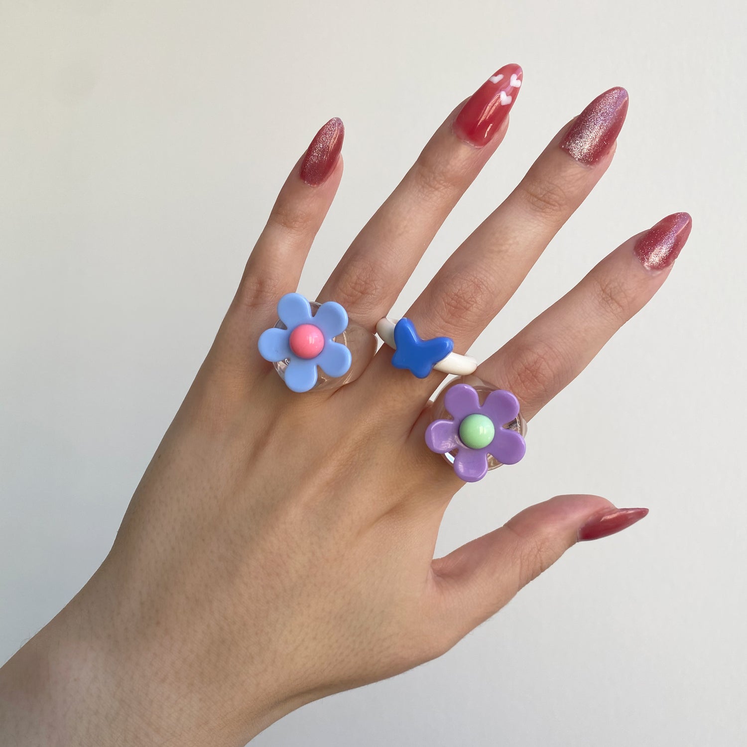 Acrylic flower and butterfly rings