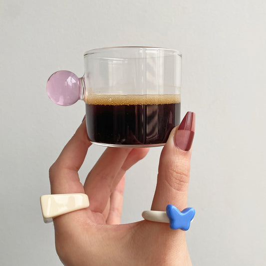 Espresso cup with pink glass ball handle