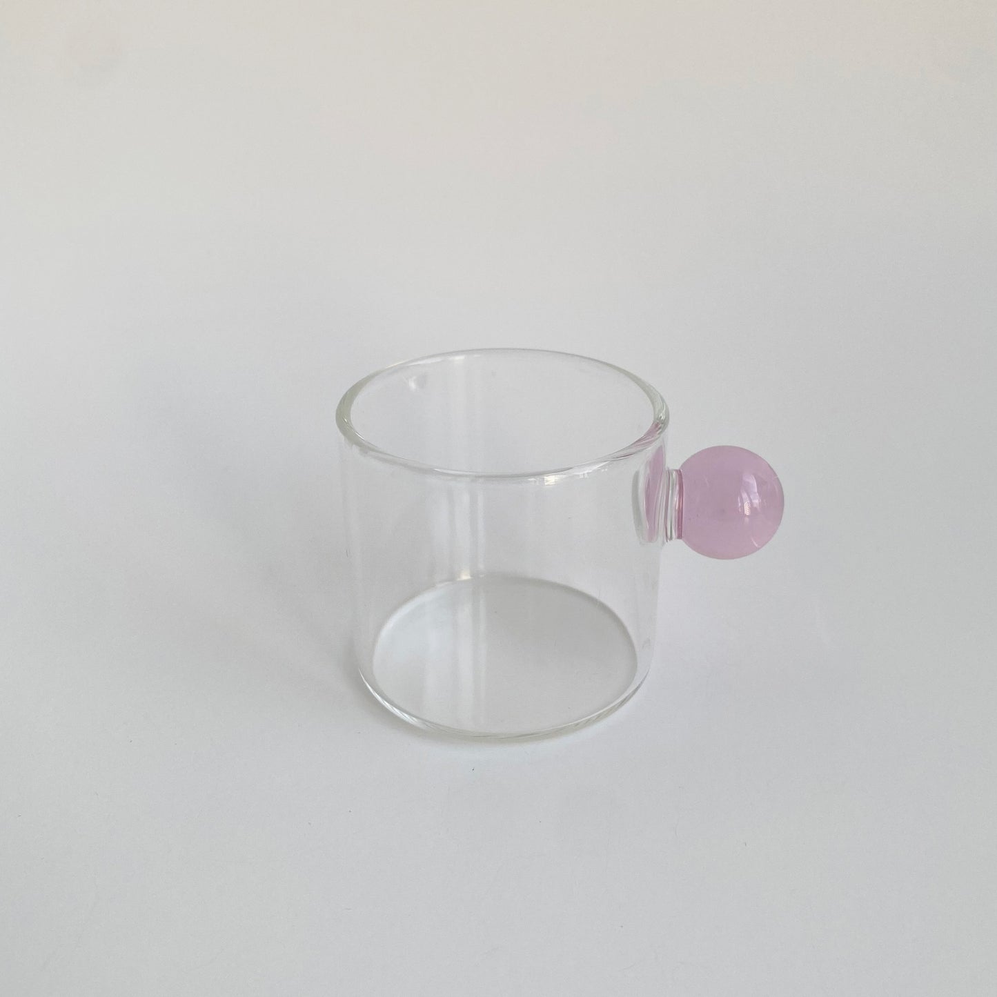 Espresso cup with pink glass ball handle