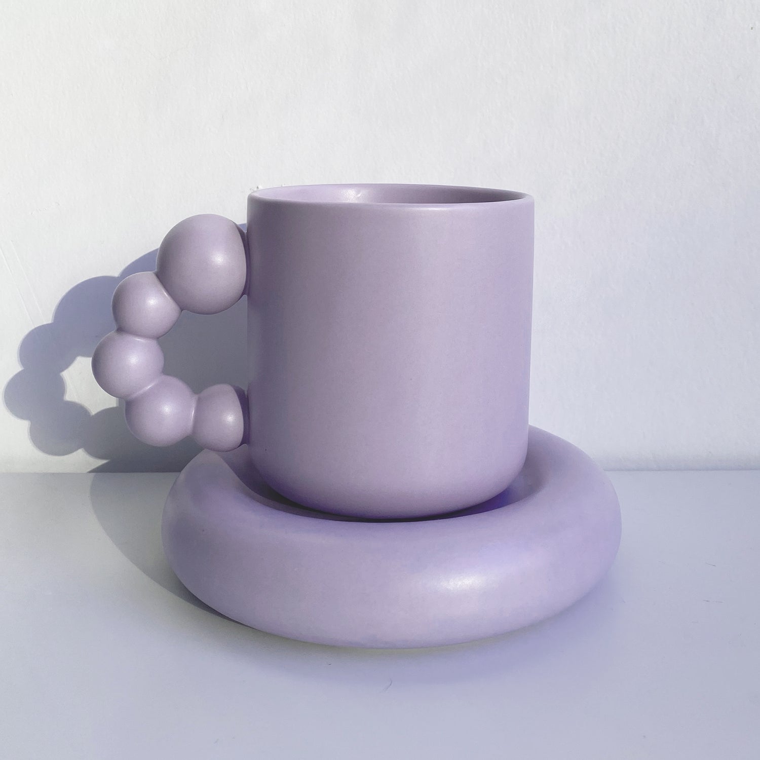 pearl handle ceramic mug in lilac purple