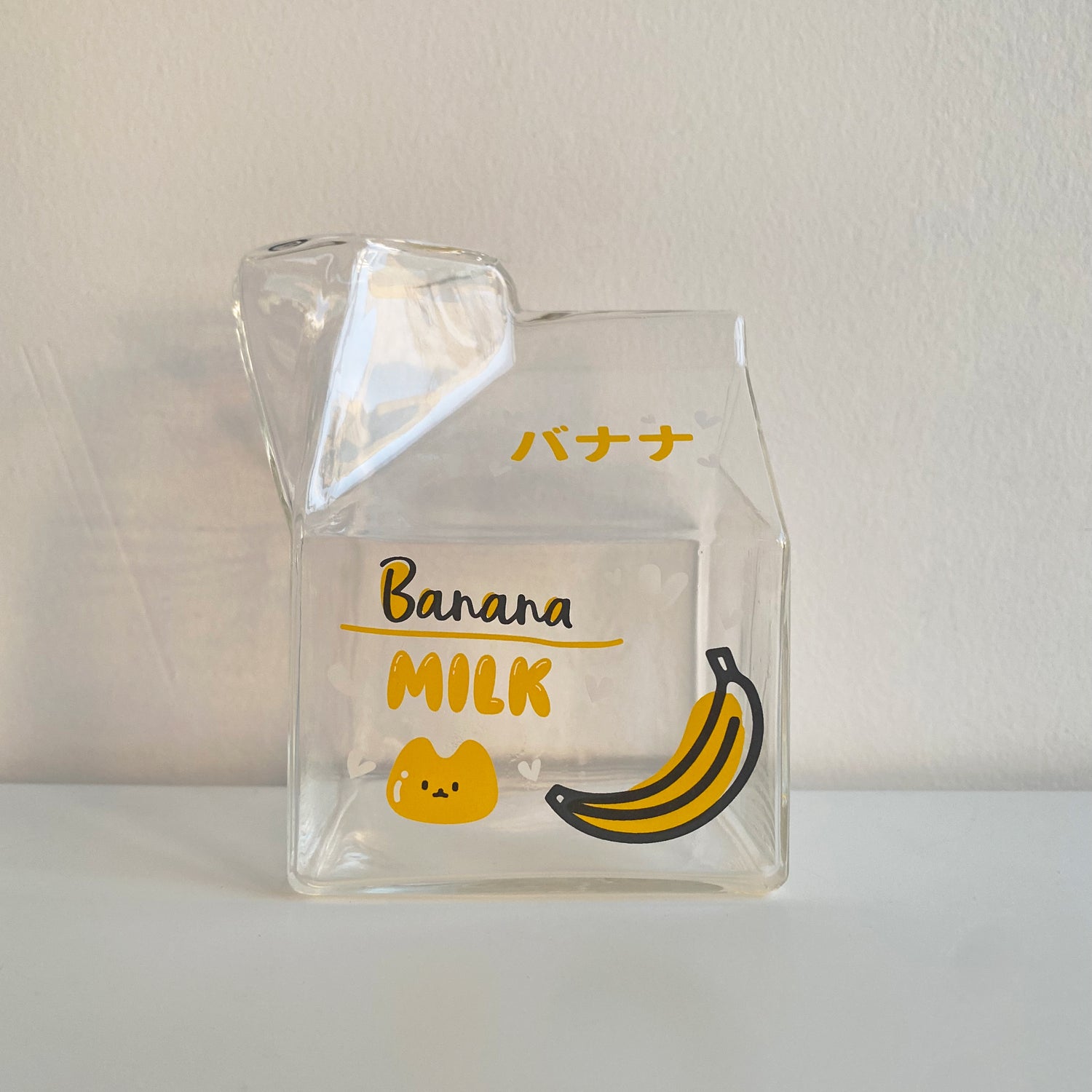 glass milk carton with cute banana design