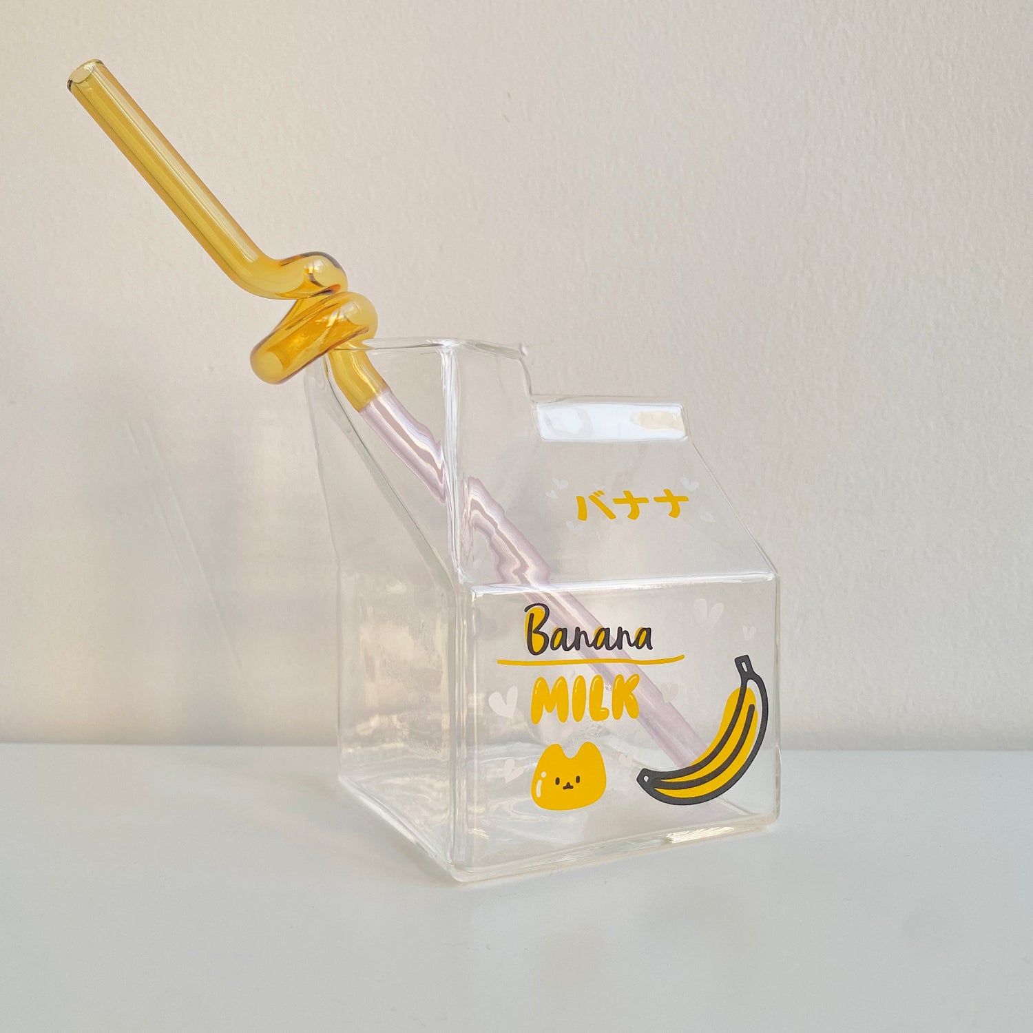glass milk carton with cute banana design